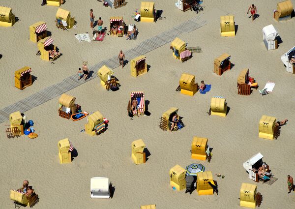 مردم در حال استراحت – ساحل تراویمیوندی، در شمال آلمان - اسپوتنیک افغانستان  