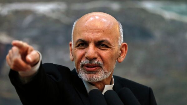 Afghanistan's President Ashraf Ghani points while speaking during a news conference in Kabul - اسپوتنیک افغانستان  