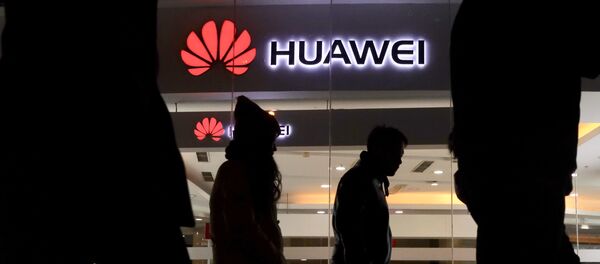 هواوی، قربانی جنگ تجاری آمریکا و چین - اسپوتنیک افغانستان  
