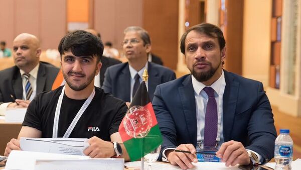 وحیدالله حمیدی با شکیب ستاری رییس فدراسیون بوکس - اسپوتنیک افغانستان  