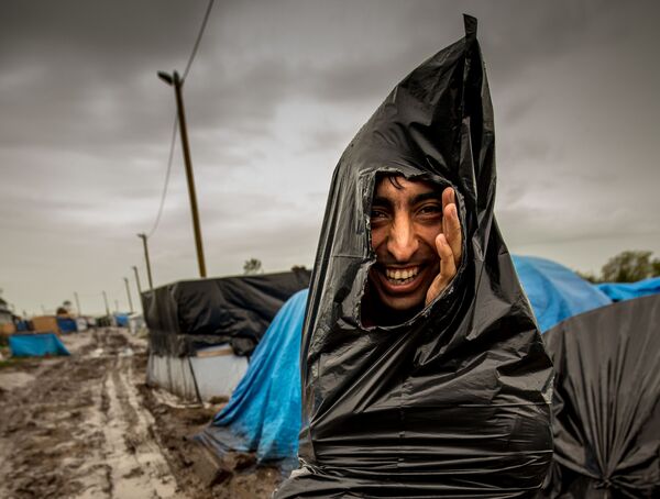 پناهجو در اردوگاه پناهجویان  فرانسه - اسپوتنیک افغانستان  
