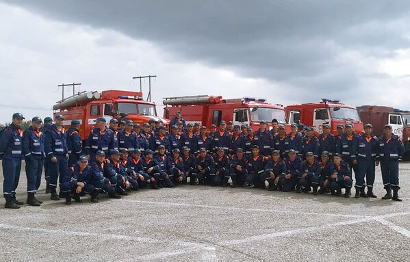 Сотрудники противопожарной службы МЧС РФ прибыли для ликвидации лесных пожаров в Якутии - اسپوتنیک افغانستان  