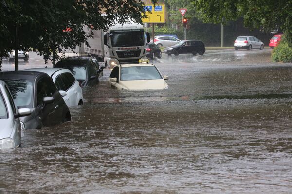 بارش شدید باران و جاری شدن سیل - شهر فلنسبورگ، آلمان  - اسپوتنیک افغانستان  