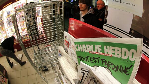 the latest issue of Charlie Hebdo newspaper at a newsstand - اسپوتنیک افغانستان  