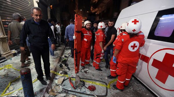 Сотрудники Красного Креста на месте теракта в Бейруте, Ливан - اسپوتنیک افغانستان  
