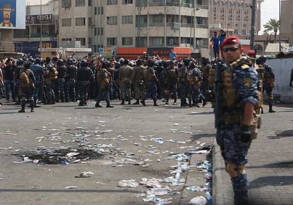 نیروهای پولیس در تظاهرات ضدحکومتی در بغداد - اسپوتنیک افغانستان  