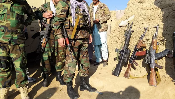 گروه طالبان دو غیر نظامی را در غور تیرباران کردند