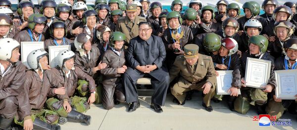 رهبر کوریای شمالی در حال کنترل رزمایش نیروهای مسلح کشور رهبر کوریای شمالی در حال کنترل رزمایش نیروهای مسلح کشور - اسپوتنیک افغانستان