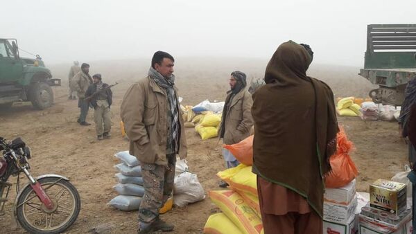 نجات صدها خانواده در منطقه طاقچه ولسوالی پشتون زرغون هرات از محاصره طالبان  - اسپوتنیک افغانستان  