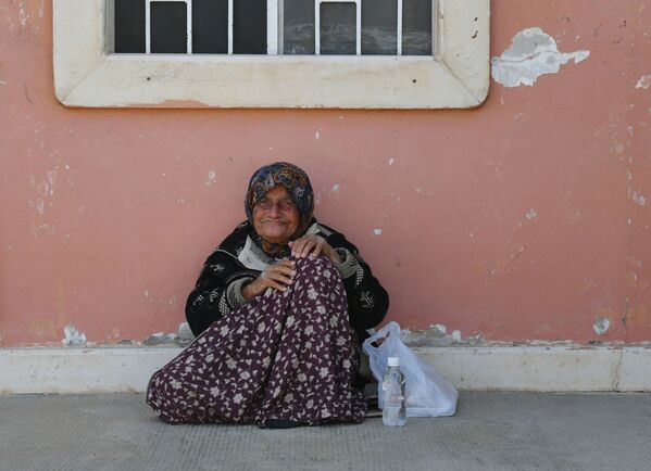 پیر زن ادلبی در اردوگاه «هیرجیل» در نزدیکی دمشق - اسپوتنیک افغانستان  