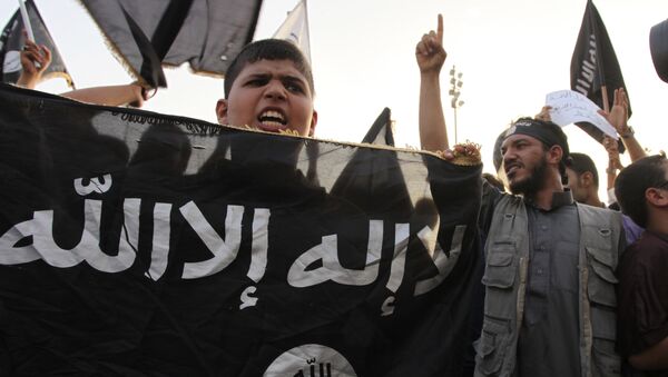 In this Friday, Sept. 14, 2012 file photo, Libyan followers of Ansar al-Shariah Brigades chant anti-U.S. slogans during a protest in front of the Tibesti Hotel, in Benghazi, Libya, as part of widespread anger across the Muslim world about a film ridiculing Islam's Prophet Muhammad - اسپوتنیک افغانستان  
