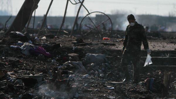 На месте крушения пассажирского лайнера Украины Boeing 737-800 - اسپوتنیک افغانستان  