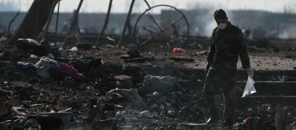 На месте крушения пассажирского лайнера Украины Boeing 737-800 На месте крушения пассажирского лайнера Украины Boeing 737-800 - اسپوتنیک افغانستان