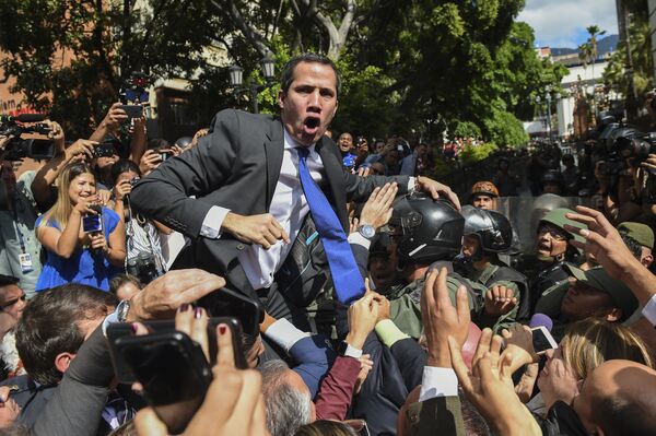 خوان گوایدا رئیس جمهور خودخوانده ونزوئلا  در برابر خبرنگاران. - اسپوتنیک افغانستان  