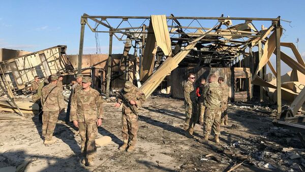 Американские военные на месте обстрела военной базы США Эйн-аль-Асад в Ираке - اسپوتنیک افغانستان  