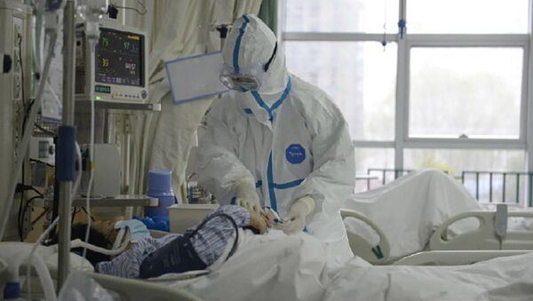 افزایش تلفات افراد مبتلا به ویروس کرونا در چین - اسپوتنیک افغانستان  