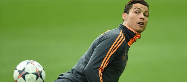 Футболист Криштиану Роналду на тренировке Футболист Криштиану Роналду на тренировке - اسپوتنیک افغانستان