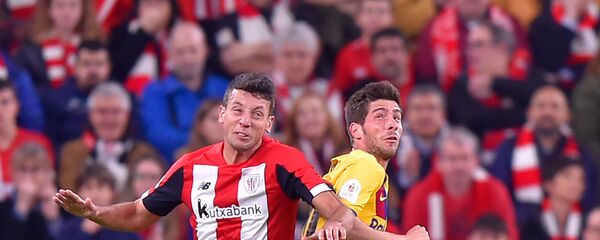 Игроки команд FC Barcelona и Athletic Bilbao во время матча - اسپوتنیک افغانستان  
