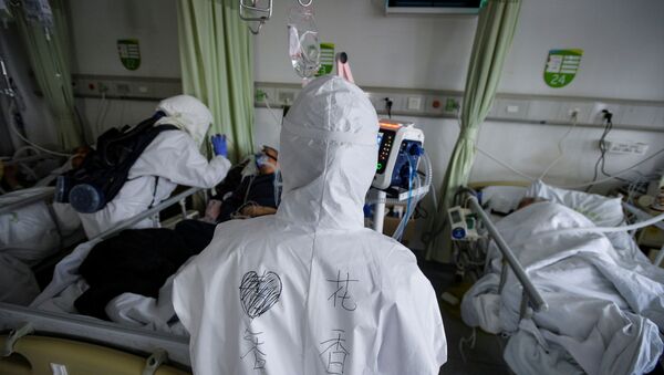 در چین، یک امریکایی در اثر کرونا ویروس درگذشت - اسپوتنیک افغانستان  