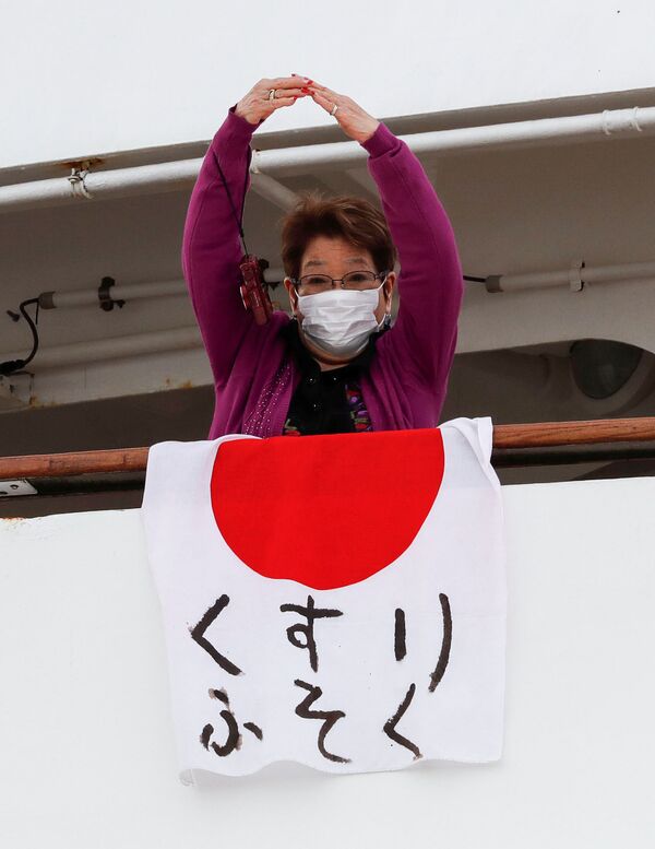 مسافر کشتی قرنطینه شده در سواحل جاپان با ماسک  - اسپوتنیک افغانستان  
