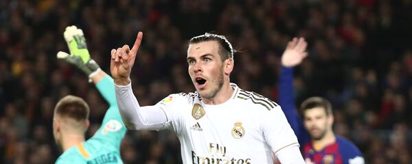 Gareth Bale, delantero del Real Madrid, tras marcar un gol de fuera de juego contra el Barcelona en el Camp Nou, el 18 de diciembre de 2019 Gareth Bale, delantero del Real Madrid, tras marcar un gol de fuera de juego contra el Barcelona en el Camp Nou, el 18 de diciembre de 2019 - اسپوتنیک افغانستان