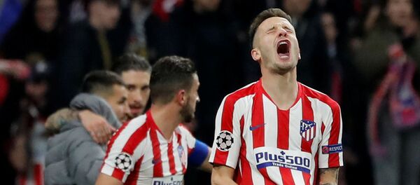 Игрок Атлетико Мадрид Сауль Ньигес празднует победу после окончания матча с Ливерпулем в Мадриде Игрок Атлетико Мадрид Сауль Ньигес празднует победу после окончания матча с Ливерпулем в Мадриде - اسپوتنیک افغانستان