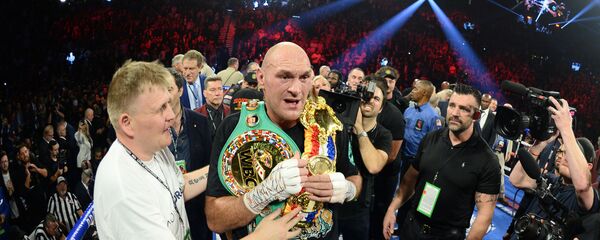 Боксер Тайсон Фьюри после победы на поединке против Деонтея Уайлдера в Лас-Вегасе  - اسپوتنیک افغانستان  