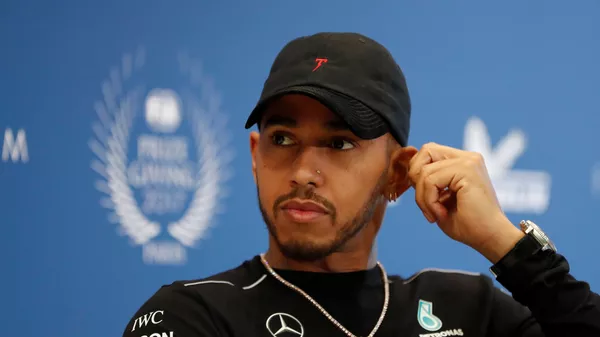 Mercedes' Formula One driver Lewis Hamilton attends the FIA Champions news conference for FIA Prize Giving 2017 in Paris, France December 8, 2017 - اسپوتنیک افغانستان  