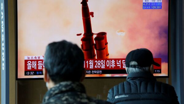 Новостной сюжет с архивными кадрами о запуске ракет в КНДР в Сеуле  - اسپوتنیک افغانستان  