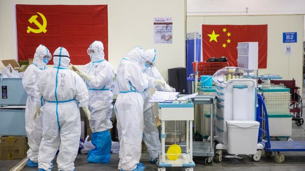 توضیحات داکتران چینی درمورد ناقلین بدون علایم کرونا ویروس - اسپوتنیک افغانستان  