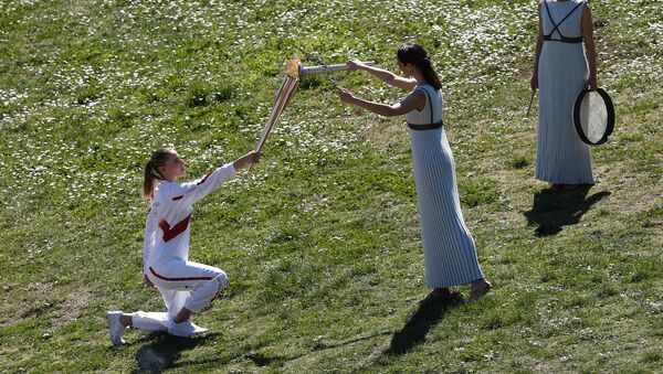 Церемония зажжения Олимпийского огня в Греции - اسپوتنیک افغانستان  