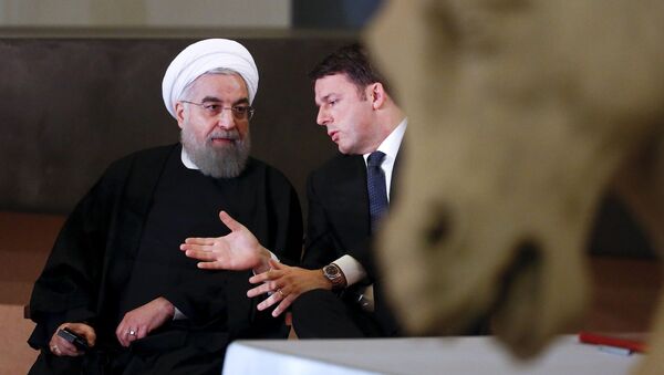 Президент Ирана Хасан Роухани и премьер-министр Италии Маттео Ренци на встрече в Риме - اسپوتنیک افغانستان  