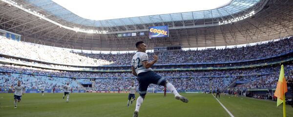 O jogador argentino Lautaro Martínes celebra após marcar gol contra o Catar em jogo válido pelo Grupo B durante a Copa América, no Brasil. A partida foi disputada na Arena do Grêmio, em Porto Alegre. O jogador argentino Lautaro Martínes celebra após marcar gol contra o Catar em jogo válido pelo Grupo B durante a Copa América, no Brasil. A partida foi disputada na Arena do Grêmio, em Porto Alegre. - اسپوتنیک افغانستان