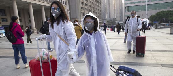 مقامات چینی راه های خروج از ووهان را باز کردند - اسپوتنیک افغانستان  