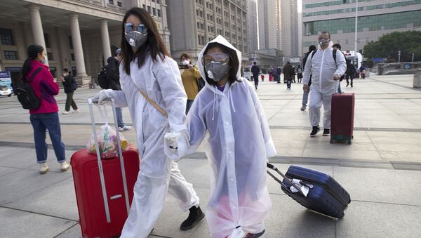 لغو صد ها پرواز در فرودگاه های چین به دلیل انتشار کرونا - اسپوتنیک افغانستان  