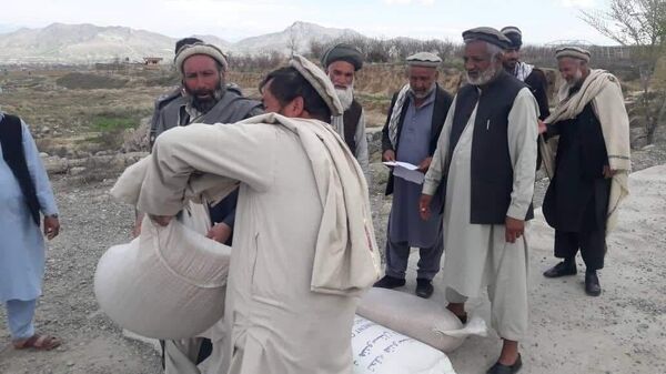 کمک برای فامیل‌های بی‌بضاعت در شرایط شیوع کرونا ویروس در افغانستان - اسپوتنیک افغانستان  