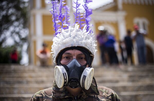 مردی با ماسک در ماناگوئه - اسپوتنیک افغانستان  
