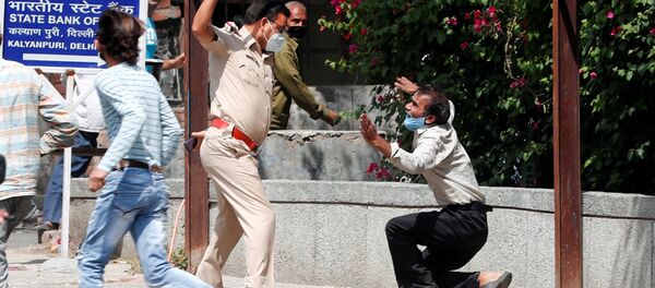 دچار شدن 9800 نفر به ویروس کرونا در هند در یک شبانه روز دچار شدن 9800 نفر به ویروس کرونا در هند در یک شبانه روز - اسپوتنیک افغانستان