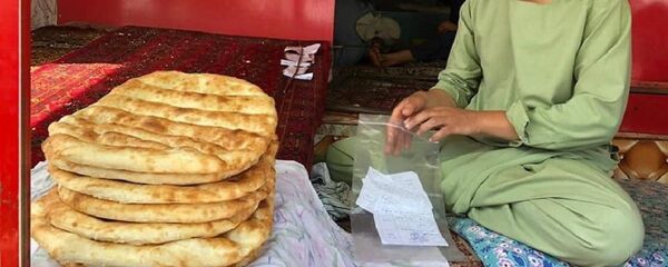 روند توزیع نان خشک در 28 ولایت دیگر افغانستان نیز آغاز میگردد روند توزیع نان خشک در 28 ولایت دیگر افغانستان نیز آغاز میگردد - اسپوتنیک افغانستان