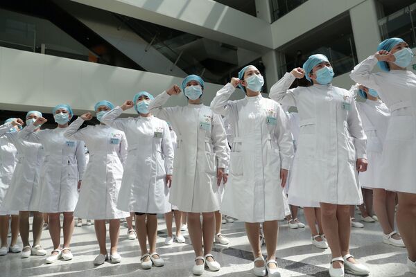 بهترین تصاویر این هفته اسپوتنیک/ پرستاران بیمارستانی در چین - اسپوتنیک افغانستان  