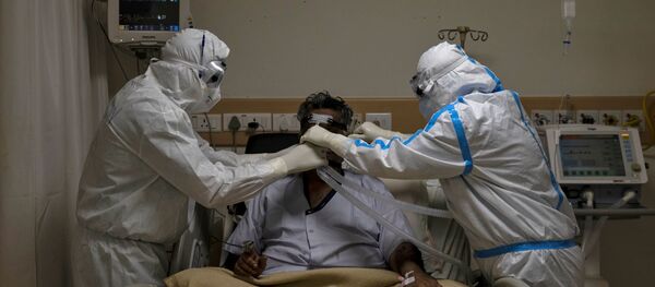 شمار مبتلایان کرونا در هند از مرز 600 هزار نفر فراتر رفت  - اسپوتنیک افغانستان  