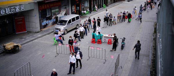 شناسایی ویروس کرونا در ماهی و گوشت وارداتی در ووهان چین - اسپوتنیک افغانستان  