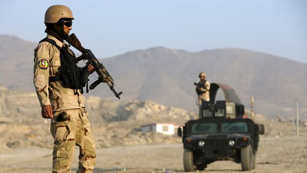 Afghan policemen stand guard at a checkpoint in Deh Sabz district, Kabul, Afghanistan - اسپوتنیک افغانستان  