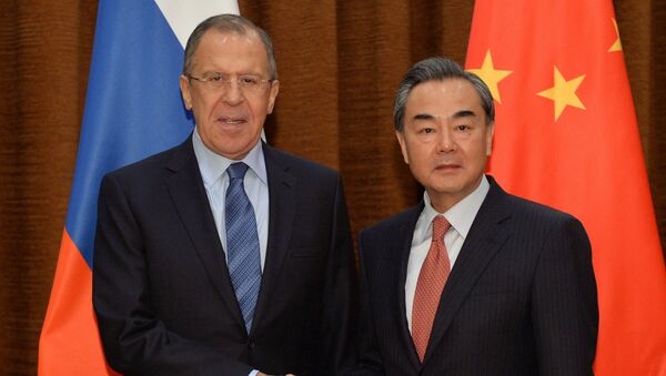 روسیه و چین توافق کردند که مواضع خود را در قبال سوریه، ایران و لیبی هماهنگ کنند - اسپوتنیک افغانستان  