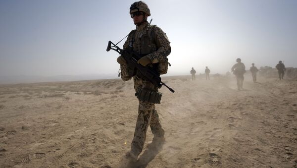 Немецкий солдат патрулирует местность в провинции Кундуз в Афганистане - اسپوتنیک افغانستان  