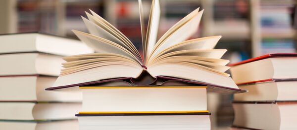 Стопка книг в библиотеке - اسپوتنیک افغانستان  