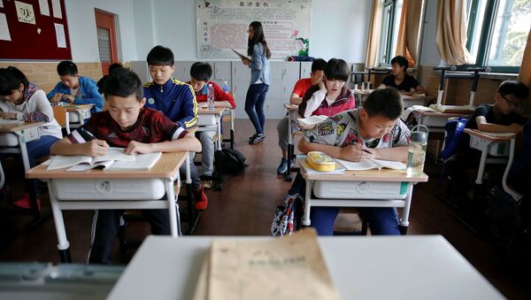 Студенты на занятиях в спортивной школе в Шанхае, Китай - اسپوتنیک افغانستان  