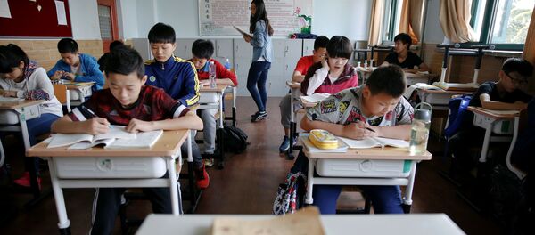 Студенты на занятиях в спортивной школе в Шанхае, Китай - اسپوتنیک افغانستان  