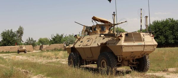 Военный патруль в городе Лашкаргах провинции Гильменд в Афганистане - اسپوتنیک افغانستان  