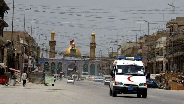 An ambulance drives in the city of Karbala, south of Baghdad. (File) - اسپوتنیک افغانستان  